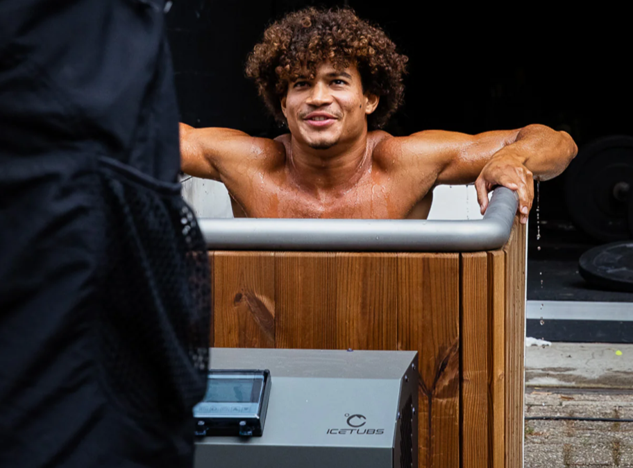 A man using a electric ice bath