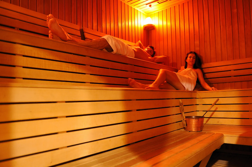 Two people in a infared sauna relieving depression